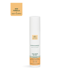 Face cream, SPF 50+, perfume-free von Karmameju – Sonnencreme in weißer Tube, orange-grünes Etikett