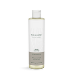 SWISH shampoo in a Karmameju bottle with flip cap and grey-brown label on a white background