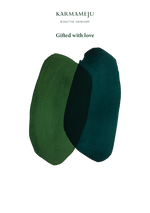 Karmameju Gift Certificate card reading “Gifted with love” with two overlapping green brushstroke shapes